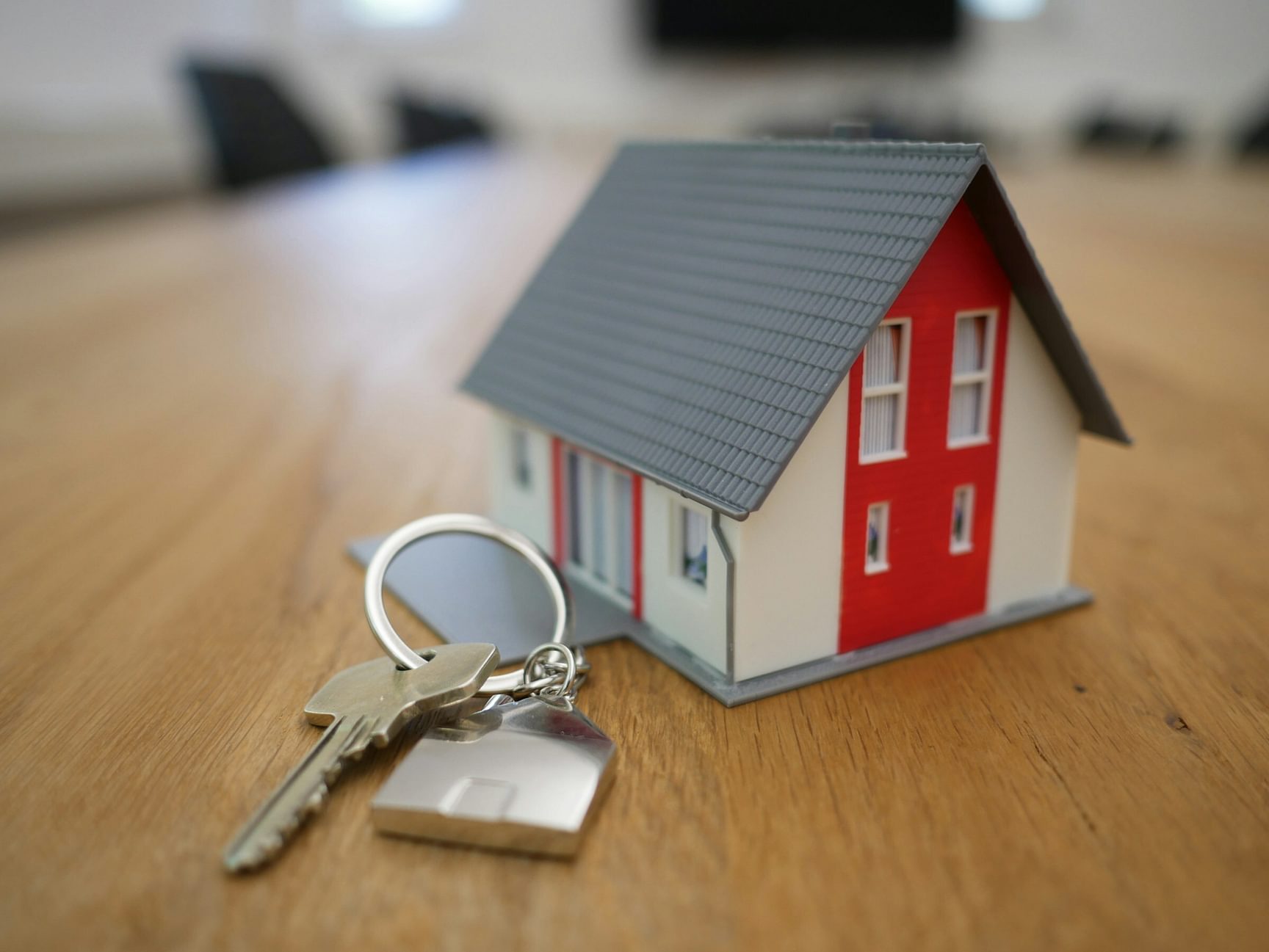 Miniatuurhuisje met huissleutel